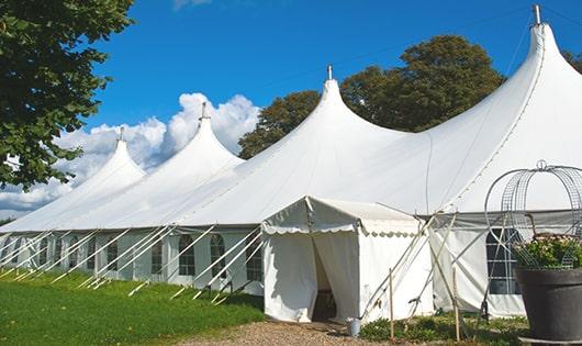 a line of sleek and modern portable toilets ready for use at an upscale corporate event in Sunol